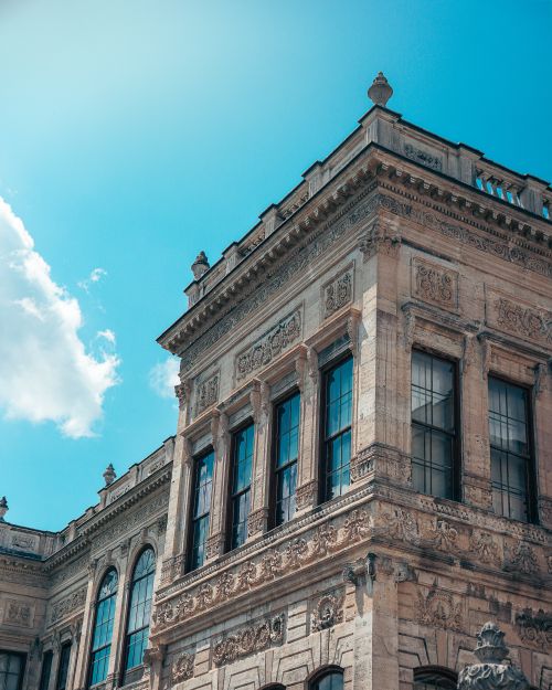Free Elegant Baroque Revival architecture of Dolmabahçe Palace in Istanbul under a clear blue sky. Stock Photo