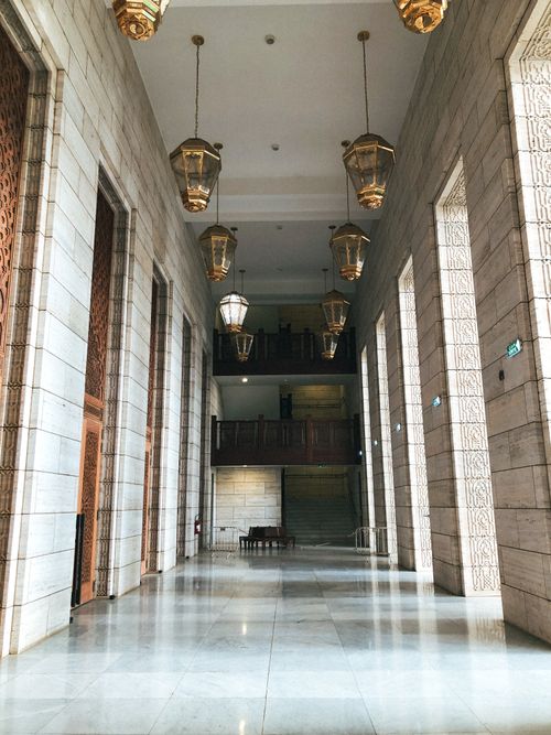 Free Elegant hallway of a mosque in Algiers, showcasing stunning Islamic architecture with intricate lanterns. Stock Photo