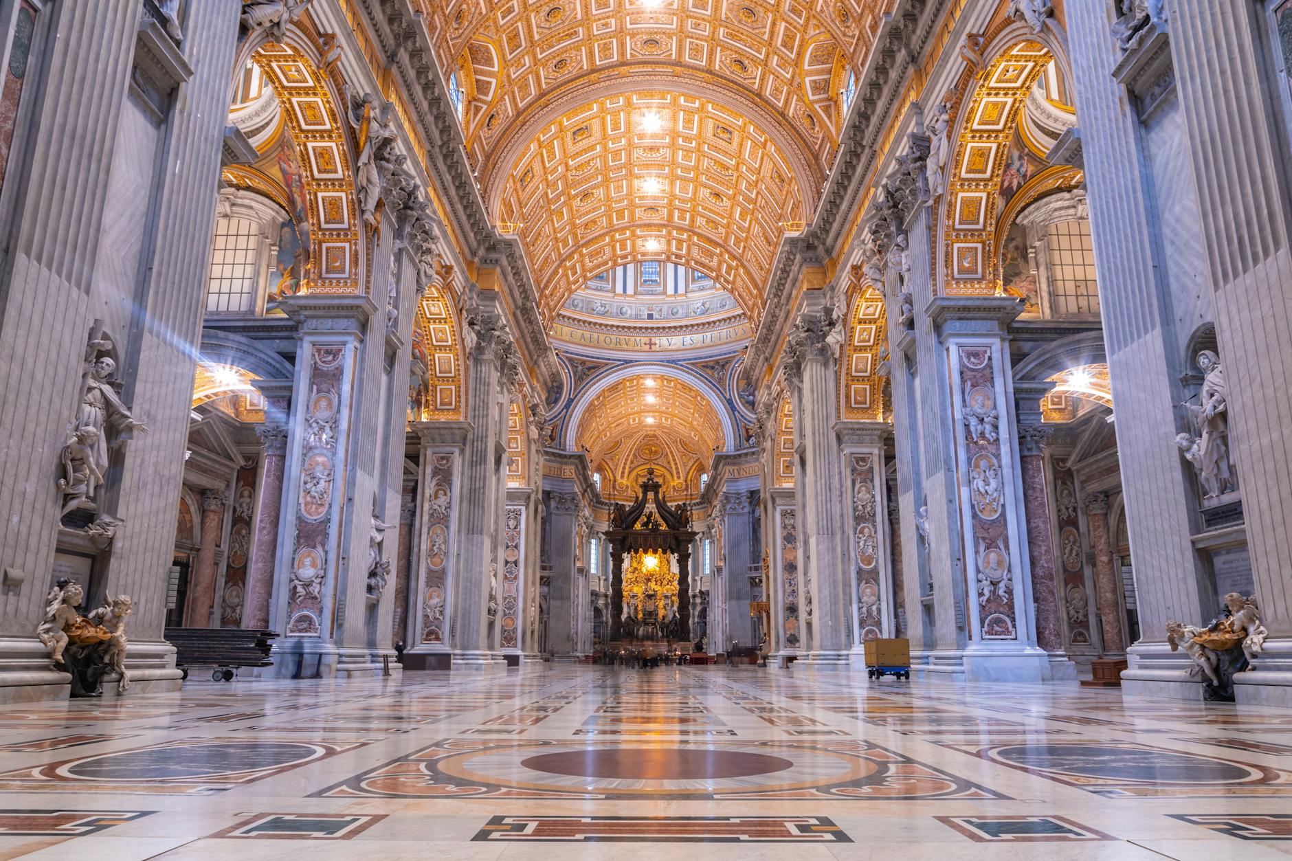 https://www.pexels.com/photo/the-interior-of-a-cathedral-with-gold-and-marble-28359706/