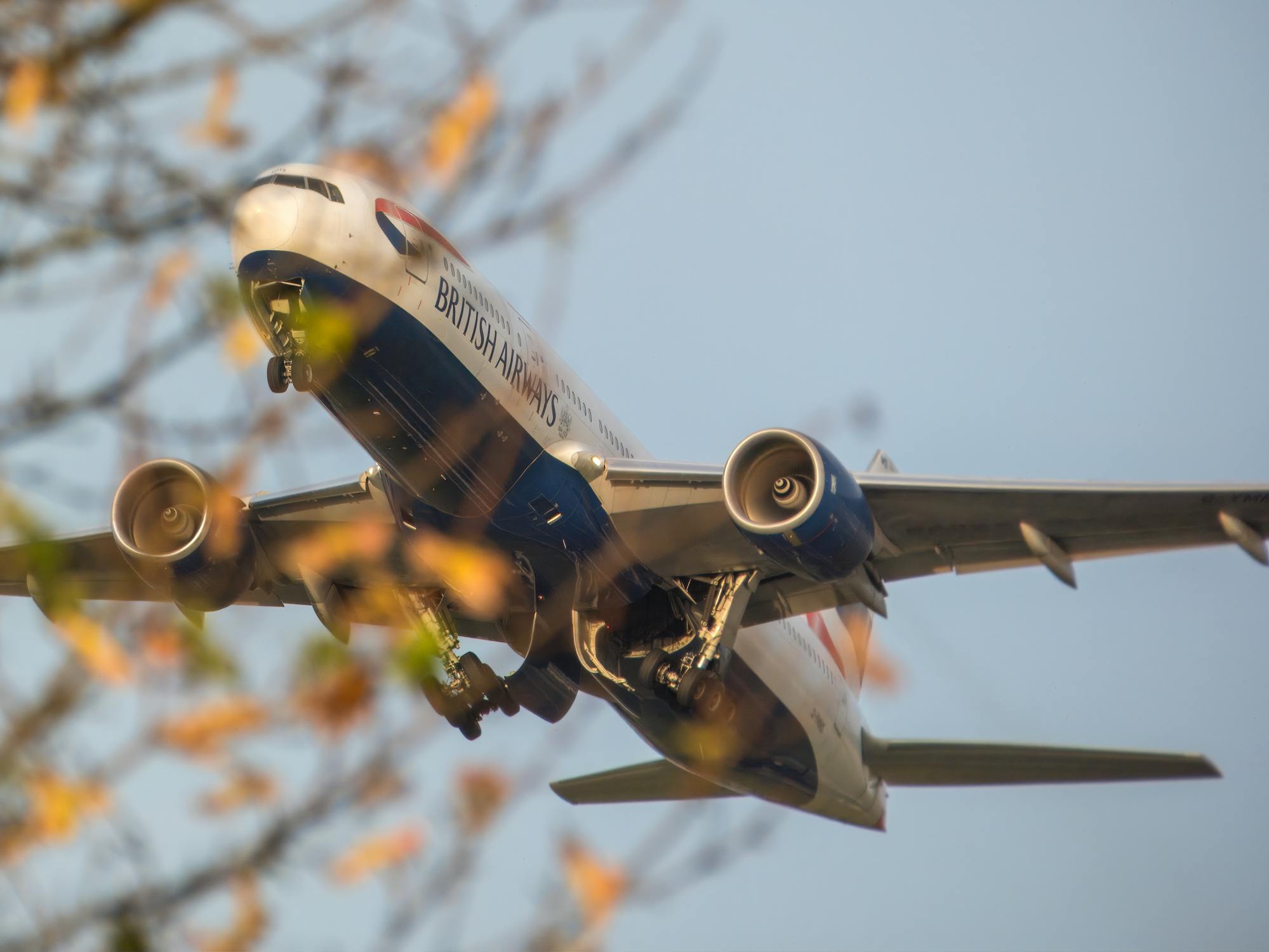 British Airways Pilot Plane Flying Overhead in Spring
