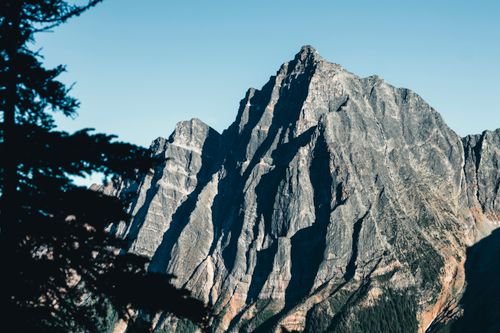Free Dramatic mountain landscape capturing steep rocky peaks in Jasper National Park, Canada. Stock Photo