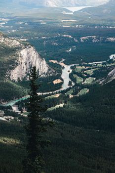 A breathtaking aerial view of the lush green valley in Banff National Park, Canada.
