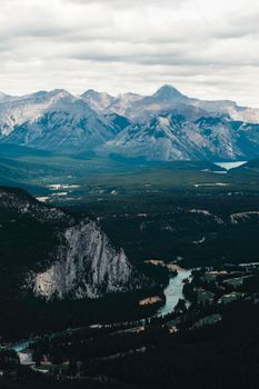Scenic aerial view of Banff's mountains and river capturing natural beauty.