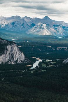 Dramatic landscape of mountains and river in Banff National Park, Alberta, Canada.