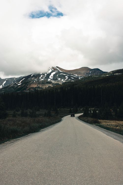 Free Explore the winding road through majestic mountains in Gibsons, BC, Canada. Stock Photo