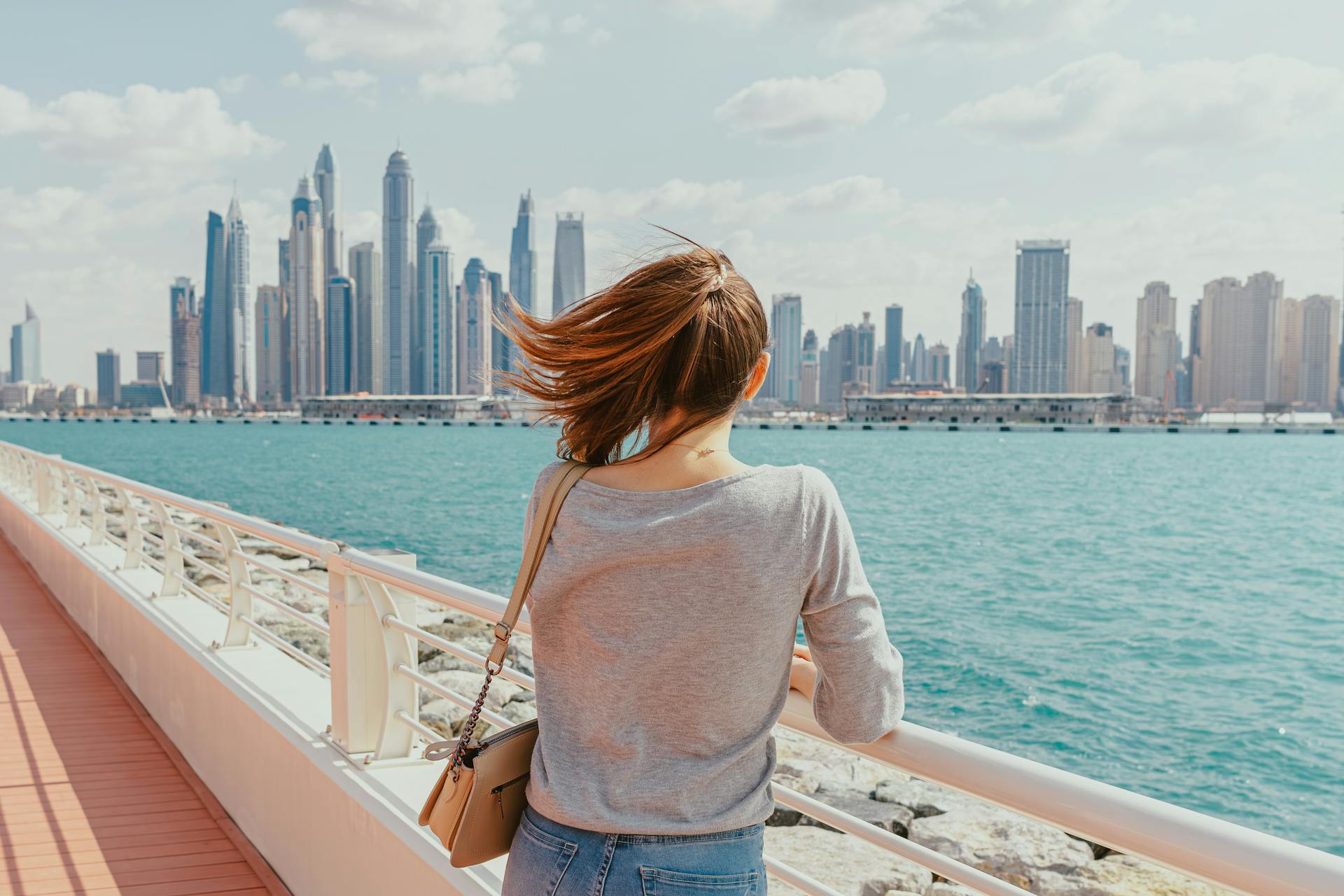 Woman Enjoying Dubai Marina Skyline View