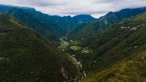 Free Breathtaking aerial view of lush green valleys in Setteville, Veneto with distant hills. Stock Photo