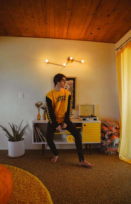 Photo Of Man Wearing Yellow Sweater