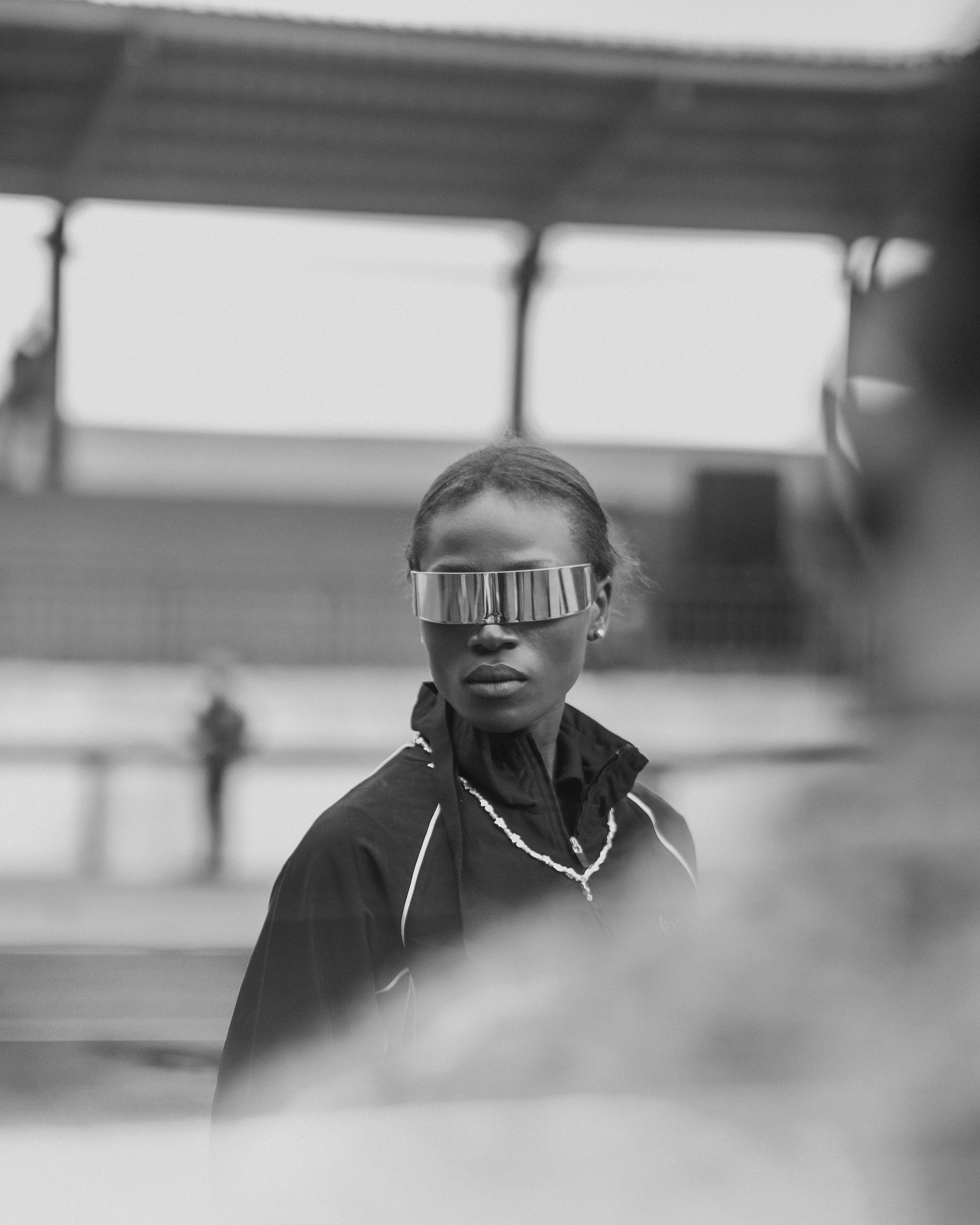 Black and white portrait of a model wearing futuristic attire in Ibadan, Nigeria.