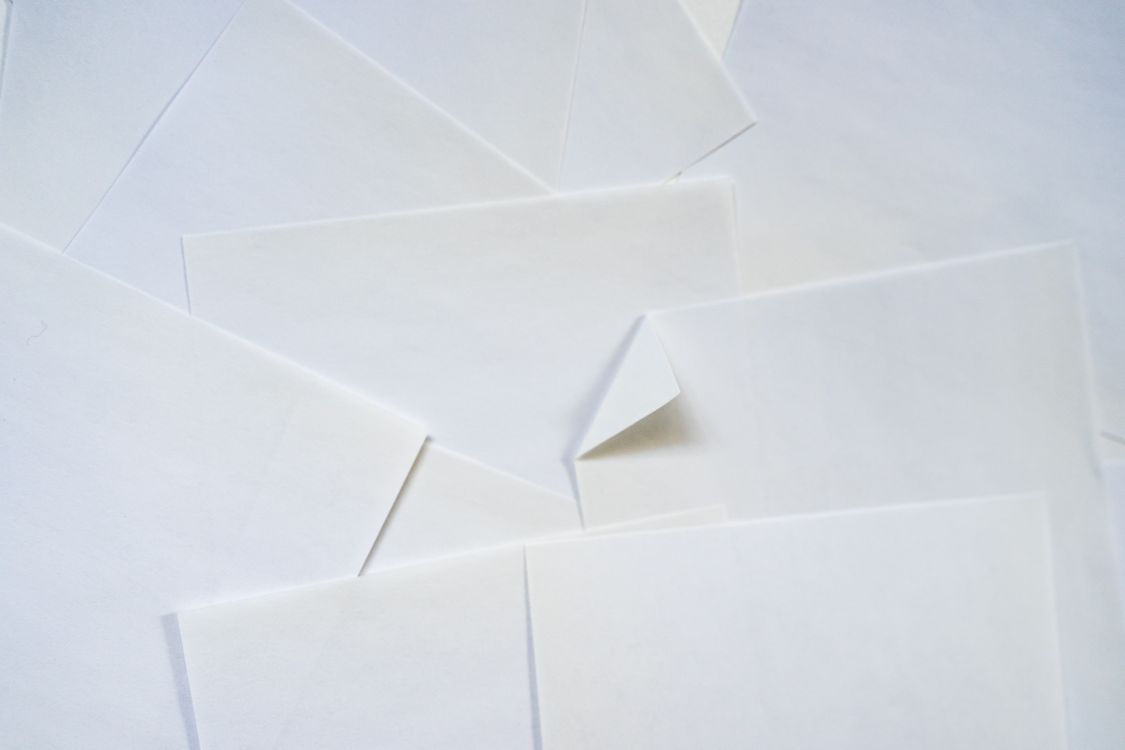 Missing Paper Empty A pile of white paper with a piece of paper missing · Free Stock Photo