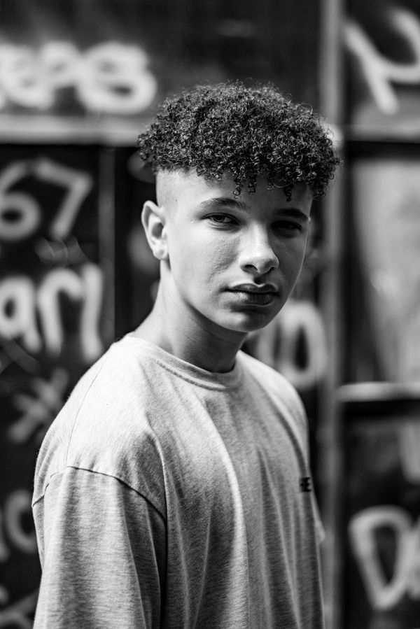 Portrait of a young man in an urban setting