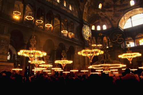Free Interior of Hagia Sophia, illuminated chandeliers, historical architecture in Istanbul, Türkiye. Stock Photo