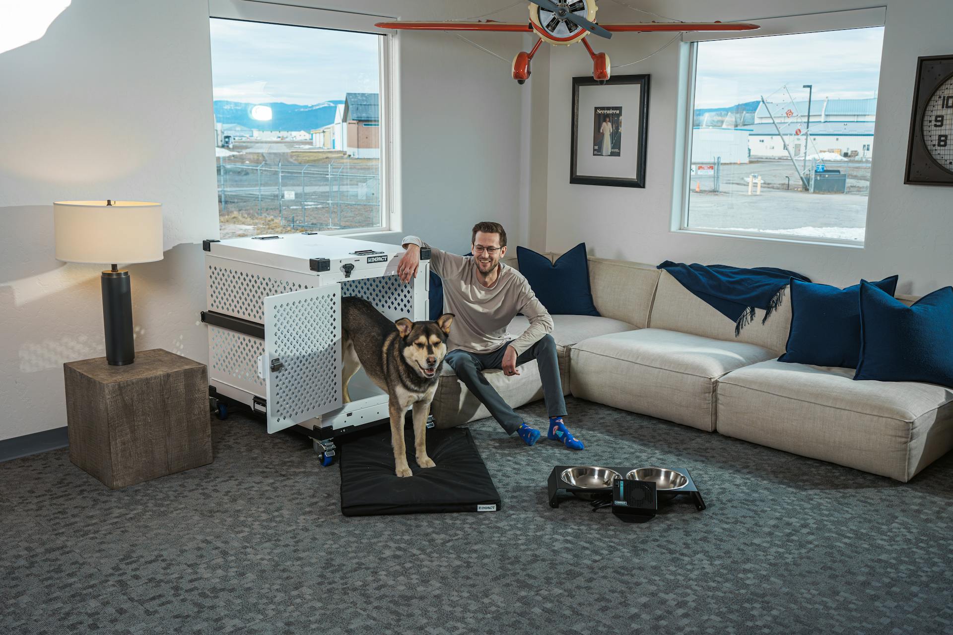 Home Office Perfection: Beautiful Couple, Dog, and Impact Dog Crate