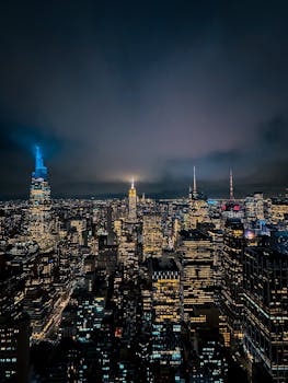 Breathtaking view of New York City's skyline illuminated at night from above.