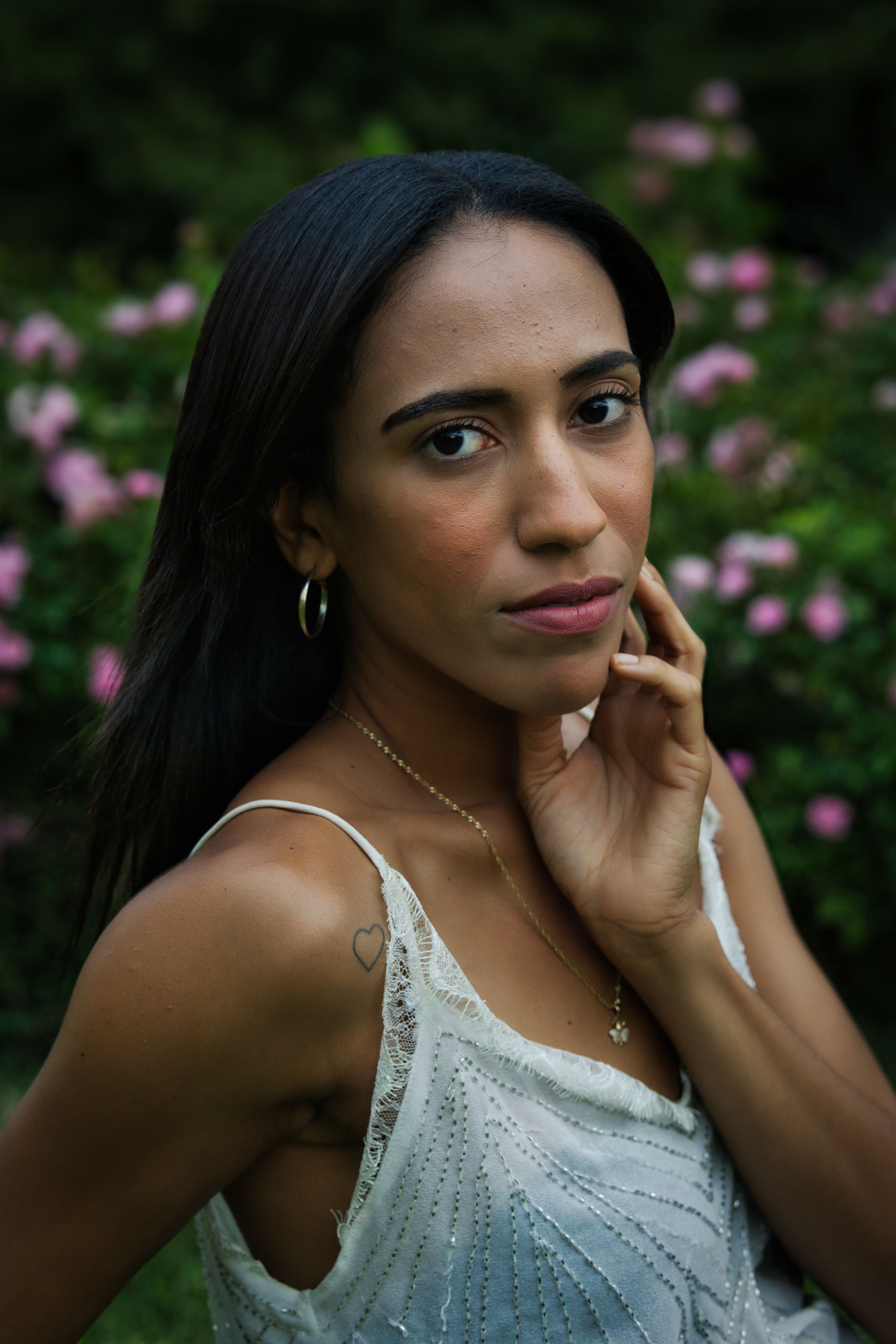 Outdoor Portrait of a Woman in Berlin Garden · Free Stock Photo