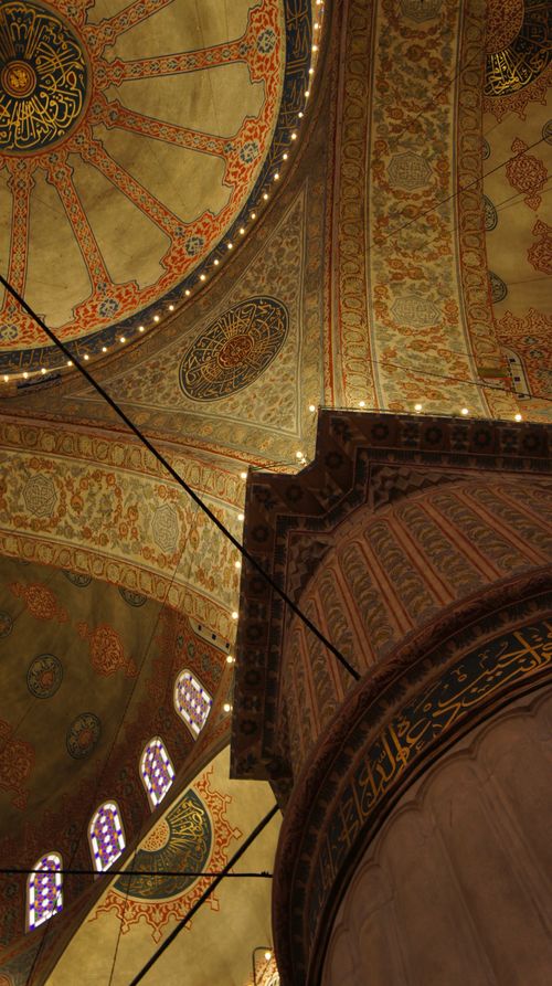 Free Intricate dome and pillar in a Middle Eastern mosque interior. Stock Photo