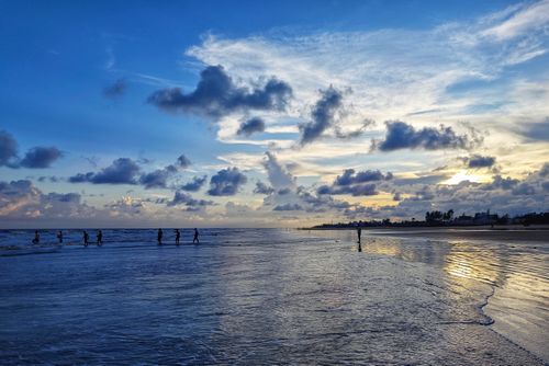 Free Stunning beach view at sunset in Mandarmani, India, perfect for travel enthusiasts. Stock Photo