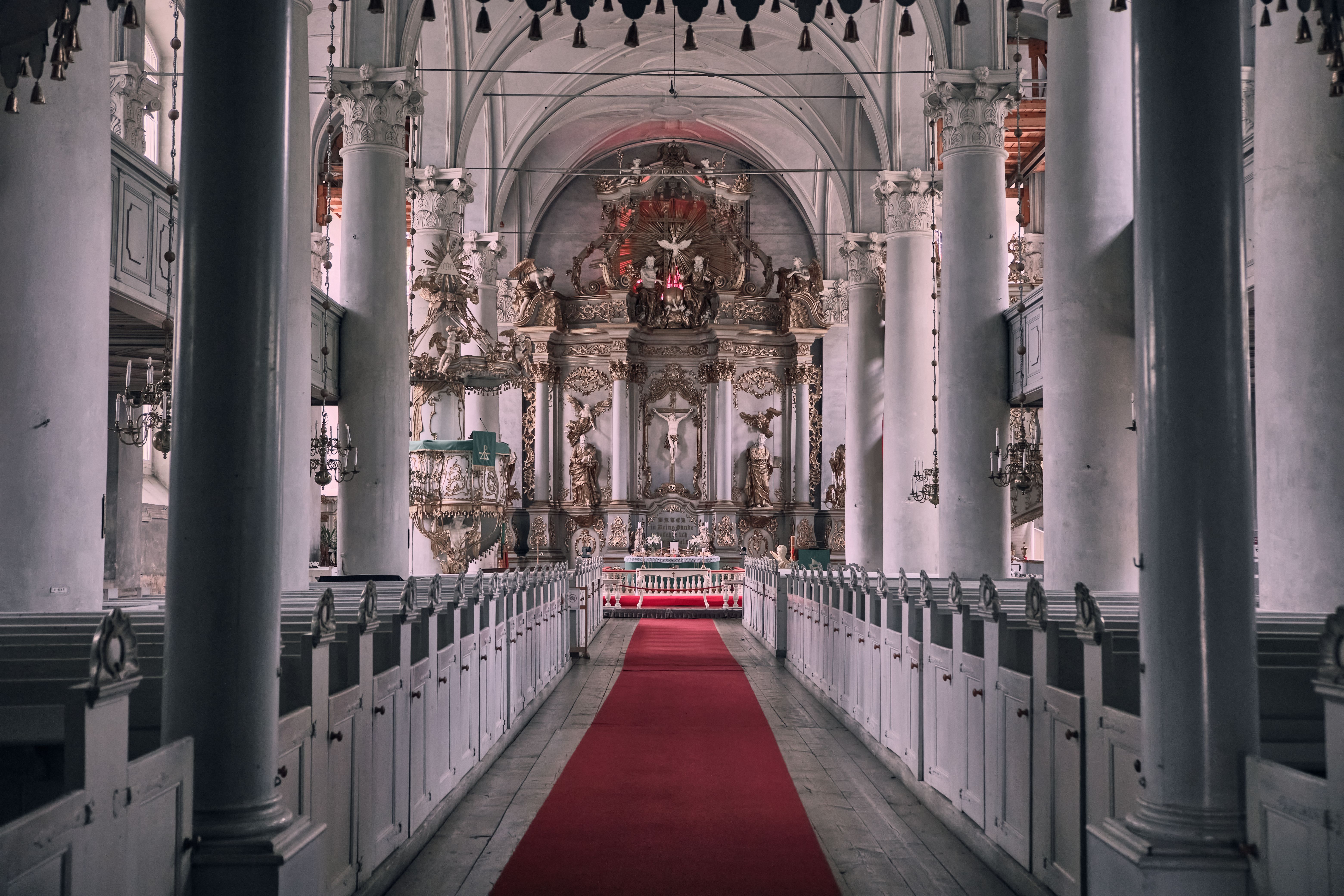 A church with red carpet and pews · Free Stock Photo