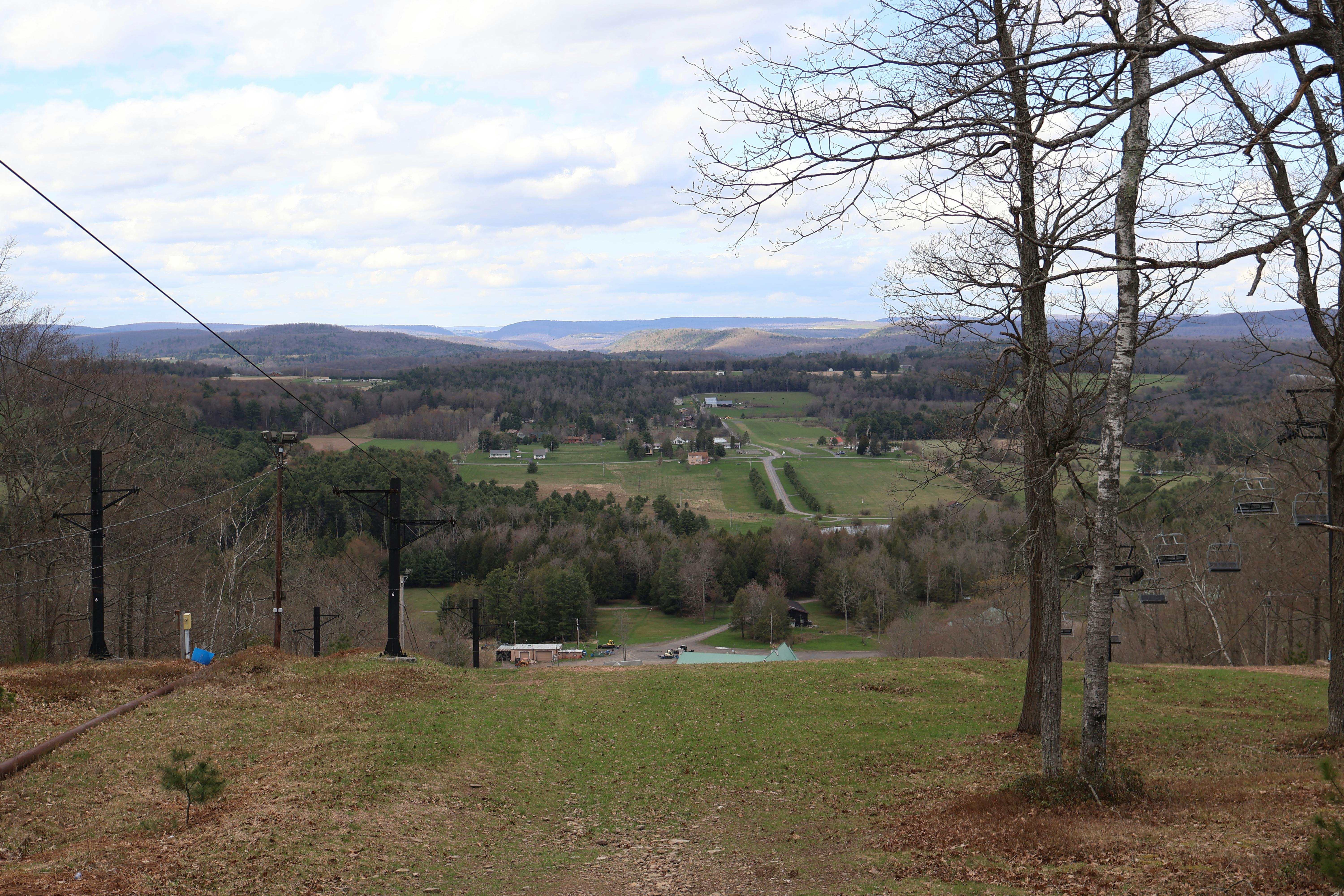 Breathtaking view of Morris, PA countryside from a hilltop on a clear spring day.