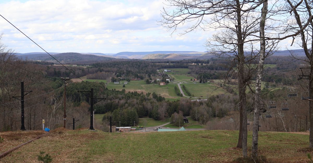 Breathtaking view of Morris, PA countryside from a hilltop on a clear spring day.