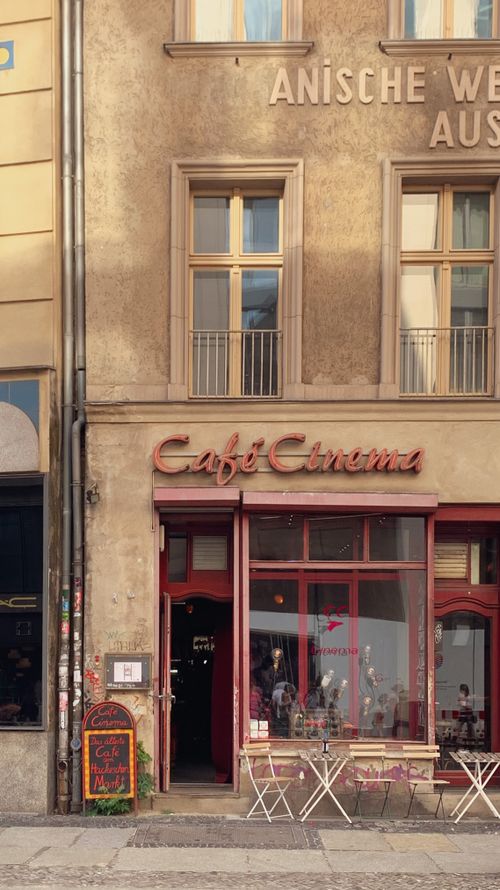 Free Capture of a quaint cafe facade in Berlin. Perfect atmosphere for enjoying a warm day. Stock Photo