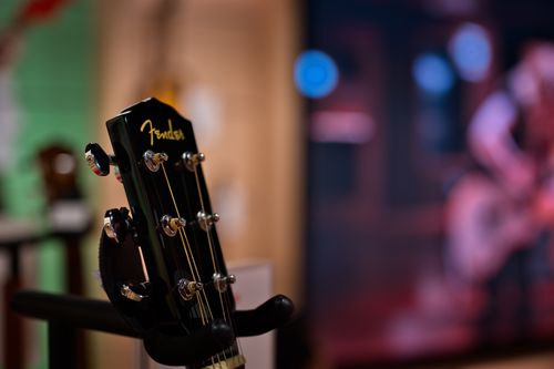 Free Detailed view of a Fender guitar headstock displayed indoors, Tokyo, Japan. Stock Photo
