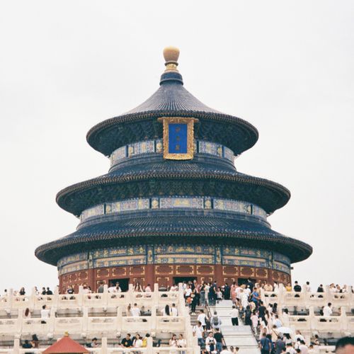 Free Temple of Heaven in Beijing surrounded by tourists during the day. Stock Photo