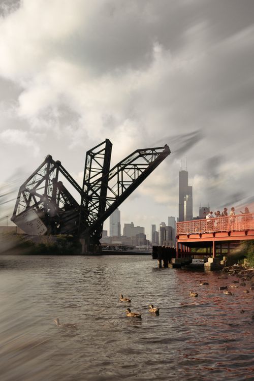 Free Scenic view of Chicago skyline with industrial bridge and river, ducks in foreground. Stock Photo