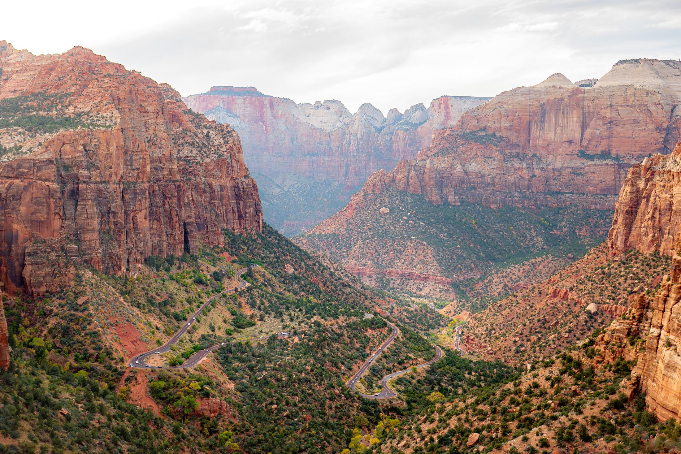 Sandstone canyon walls and desert valley near Zion National Park