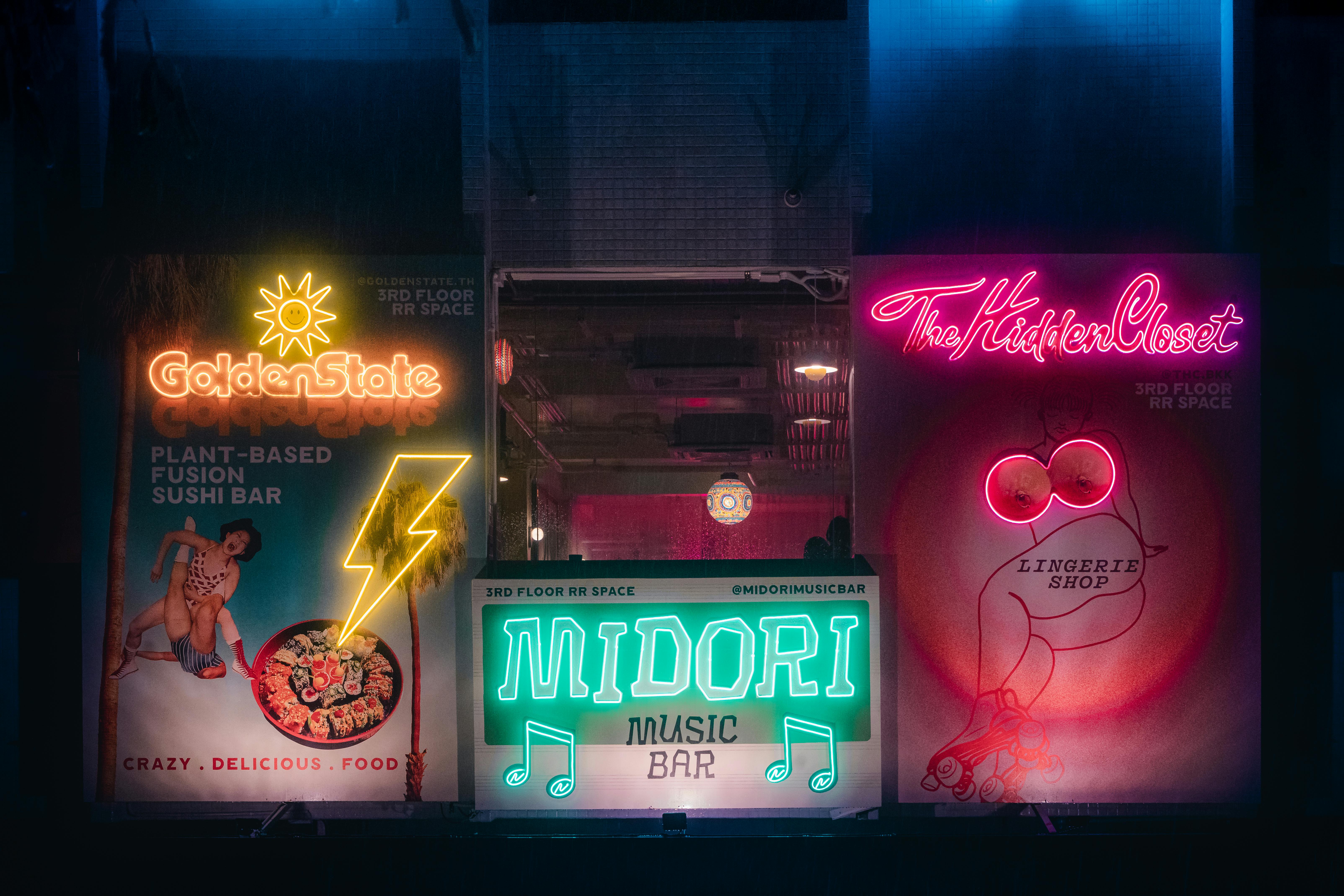 Madrid Malasaña street at night with neon lights