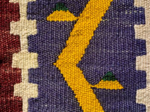 Free Close-up of a colorful handwoven Turkish kilim showcasing intricate geometric designs and traditional motifs. Stock Photo