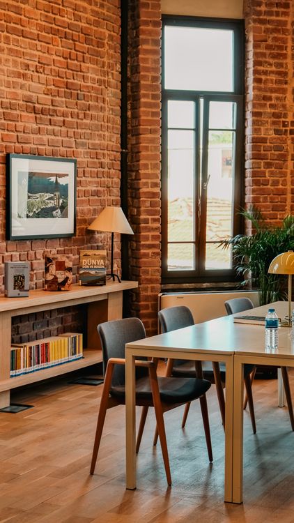 Cozy Industrial Brick Office Interior Design · Free Stock Photo