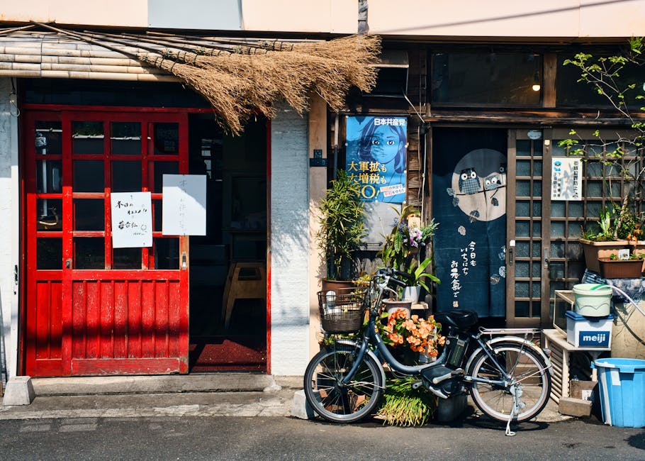Colorful murals along a bustling street with cozy cafés and spring blooms. Photo taken by Travel with Lenses