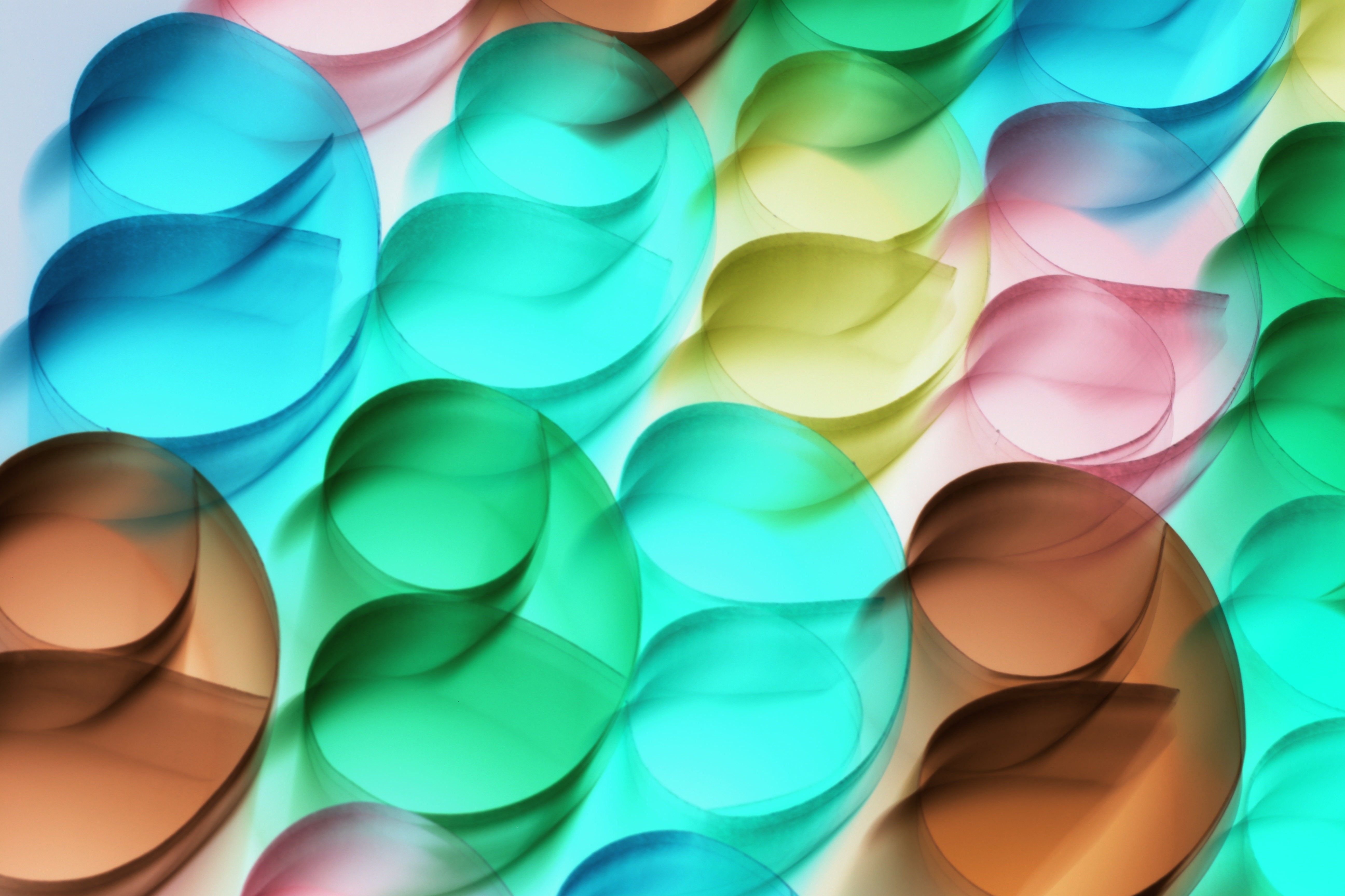 Vibrant abstract pattern with colorful translucent circles creating a dynamic visual effect.