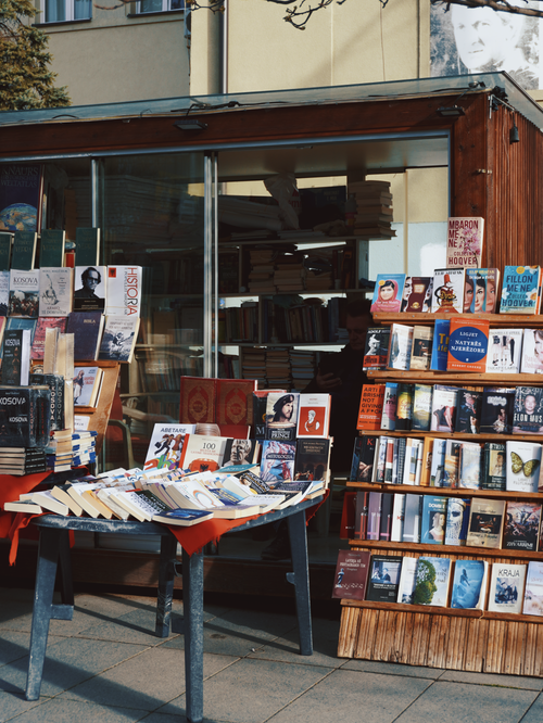 Free A captivating outdoor bookstand with a variety of books on display, perfect for book lovers. Stock Photo