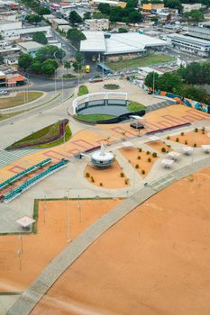 Explore a vibrant city waterfront square with colorful urban design and open spaces.