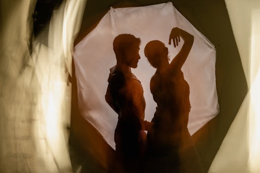 Artistic silhouette of two dancers with blurred effects, photographed in Mexico City, CDMX, Mexico.