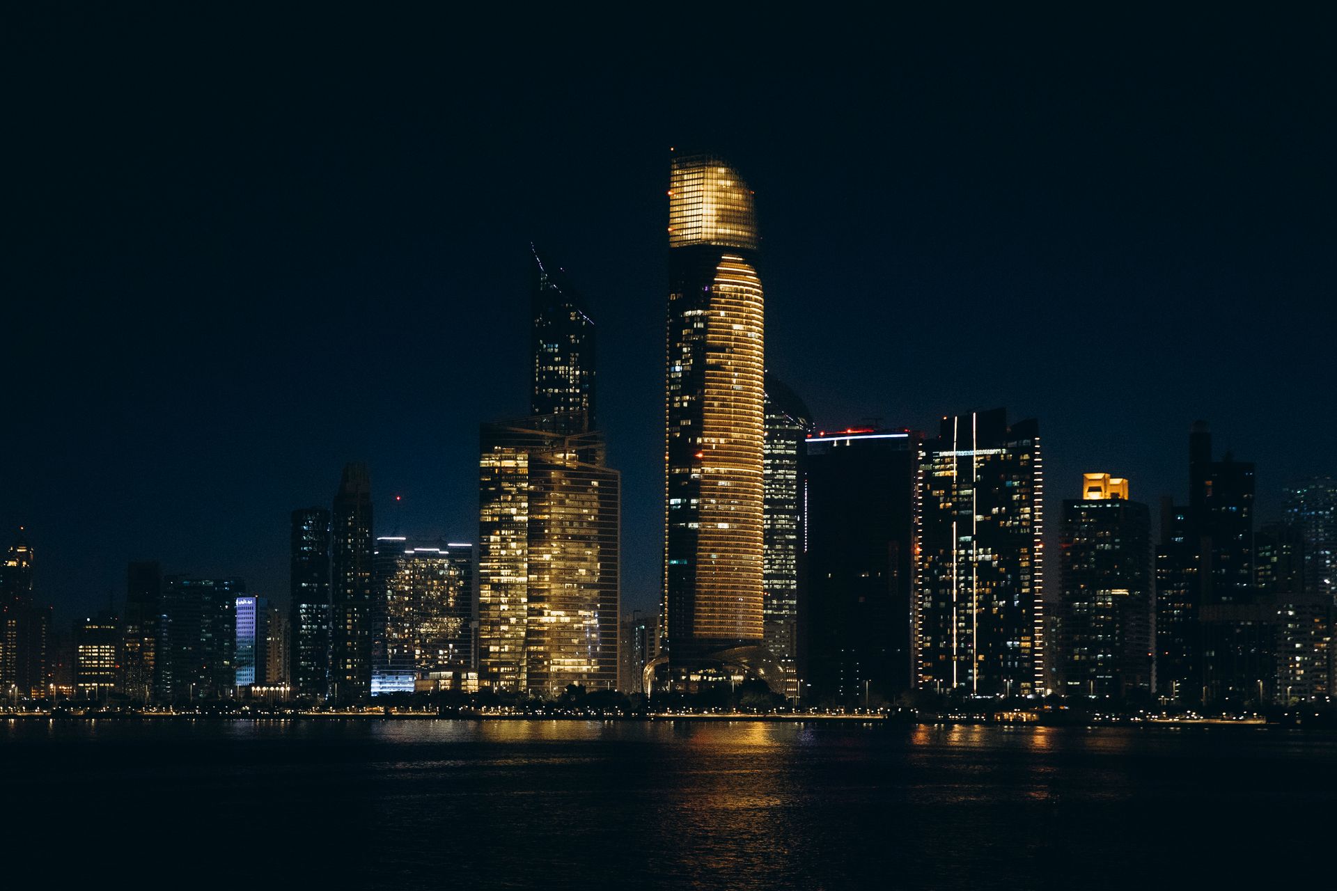 Abu Dhabi skyline seen from the Corniche at evening