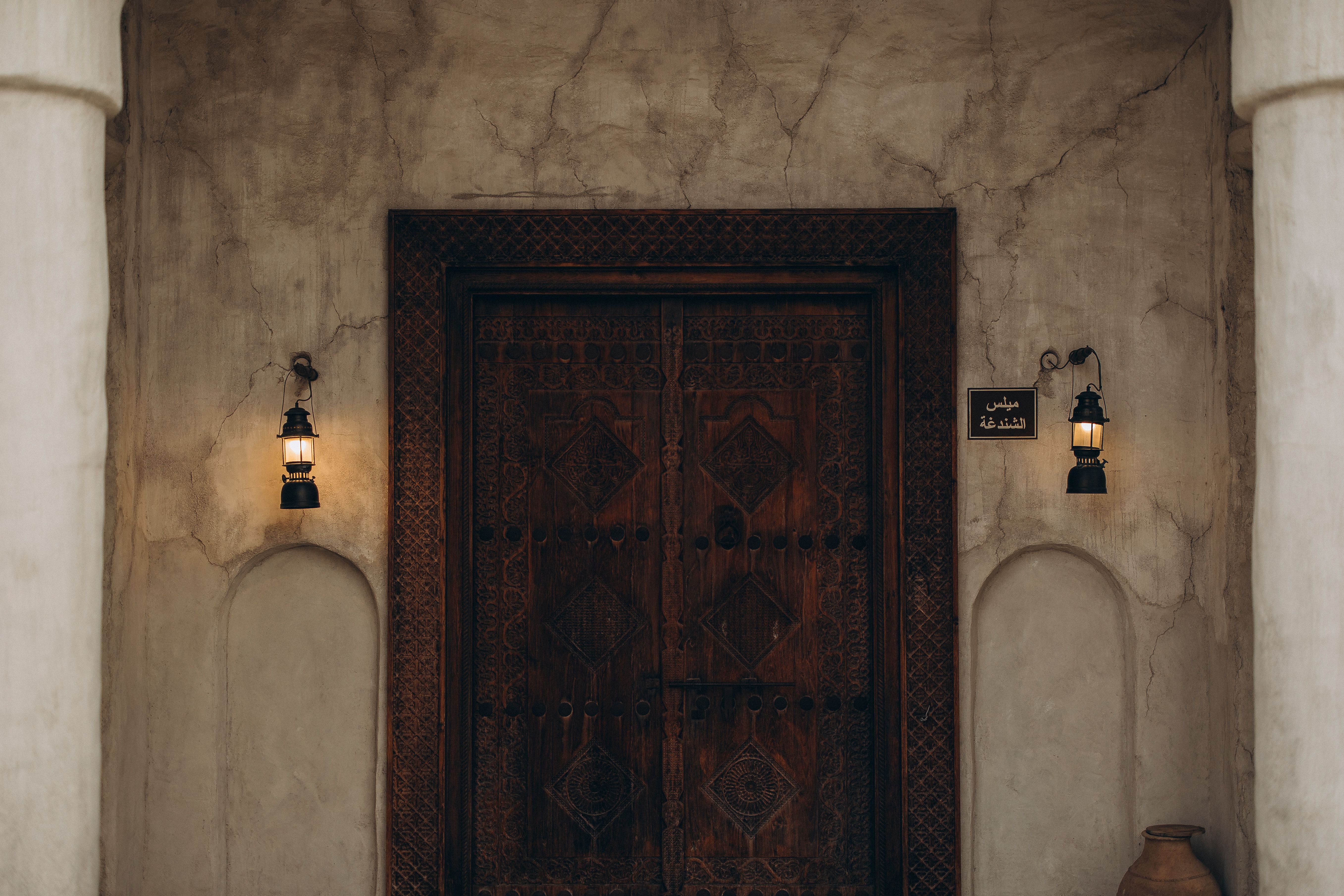 Captivating view of a traditional wooden door in historic Dubai, highlighting rich cultural heritage.