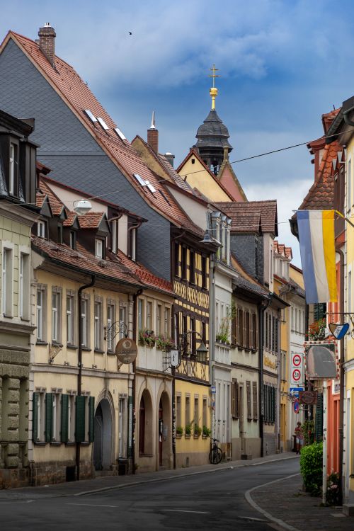 Free Historic street with colorful buildings in Bamberg, Germany, showcasing traditional architecture. Stock Photo