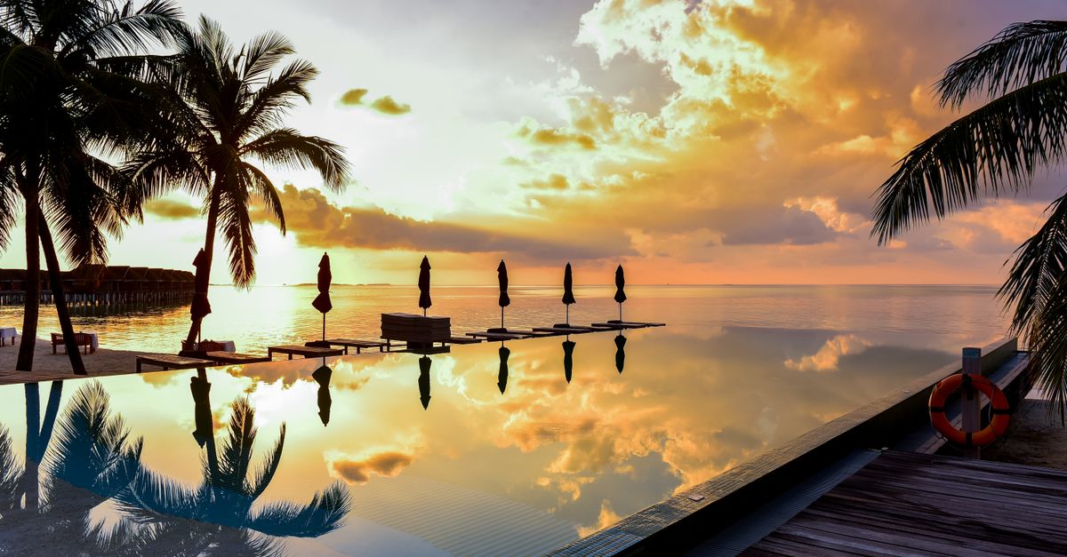 Sunset Infinity Pool Tranquil Sunset Over Tropical Infinity Pool · Free Stock Photo