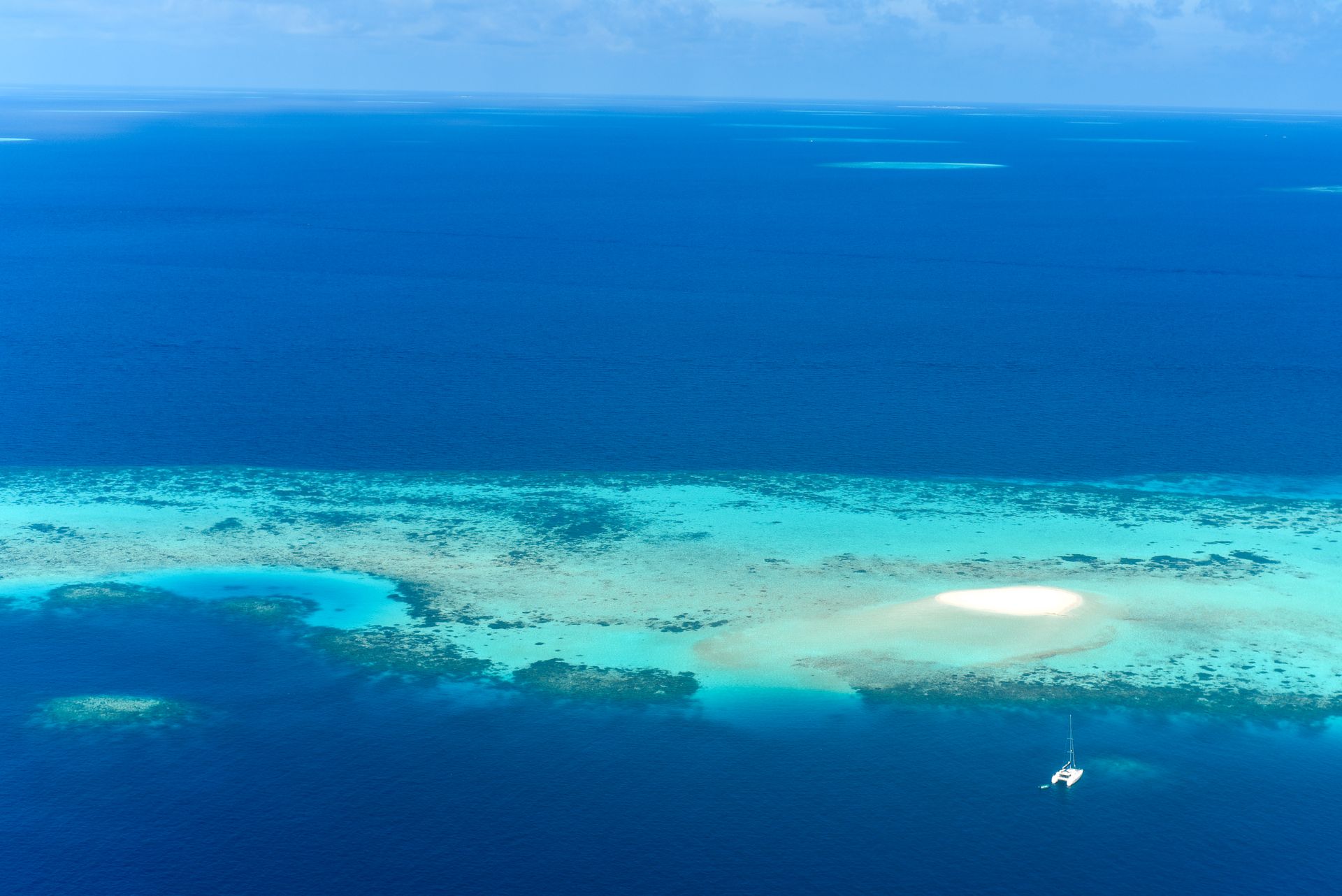 Lush island surrounded by turquoise water
