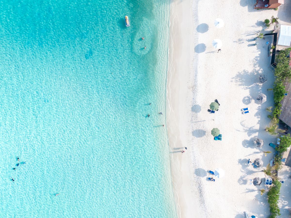 Tropical island beach with clear water
