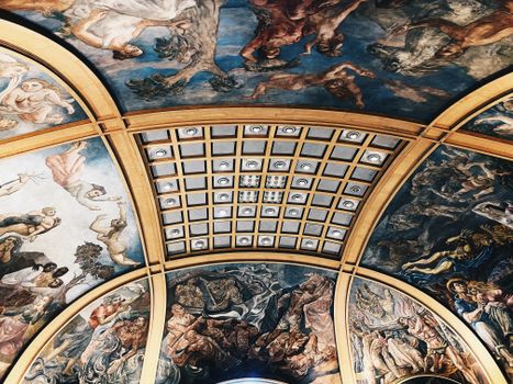 Ornate frescoed ceiling with classical art in Buenos Aires, Argentina.