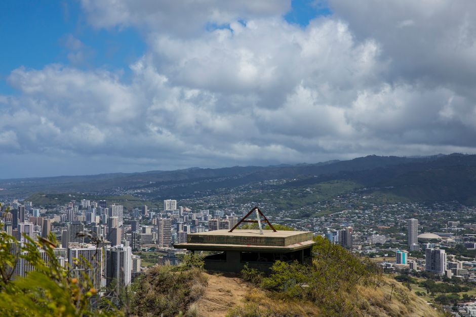 Photo by Stephen Leonardi A scenic overlook provides a panoramic view of Honolulu, Hawaii under a cloudy sky.