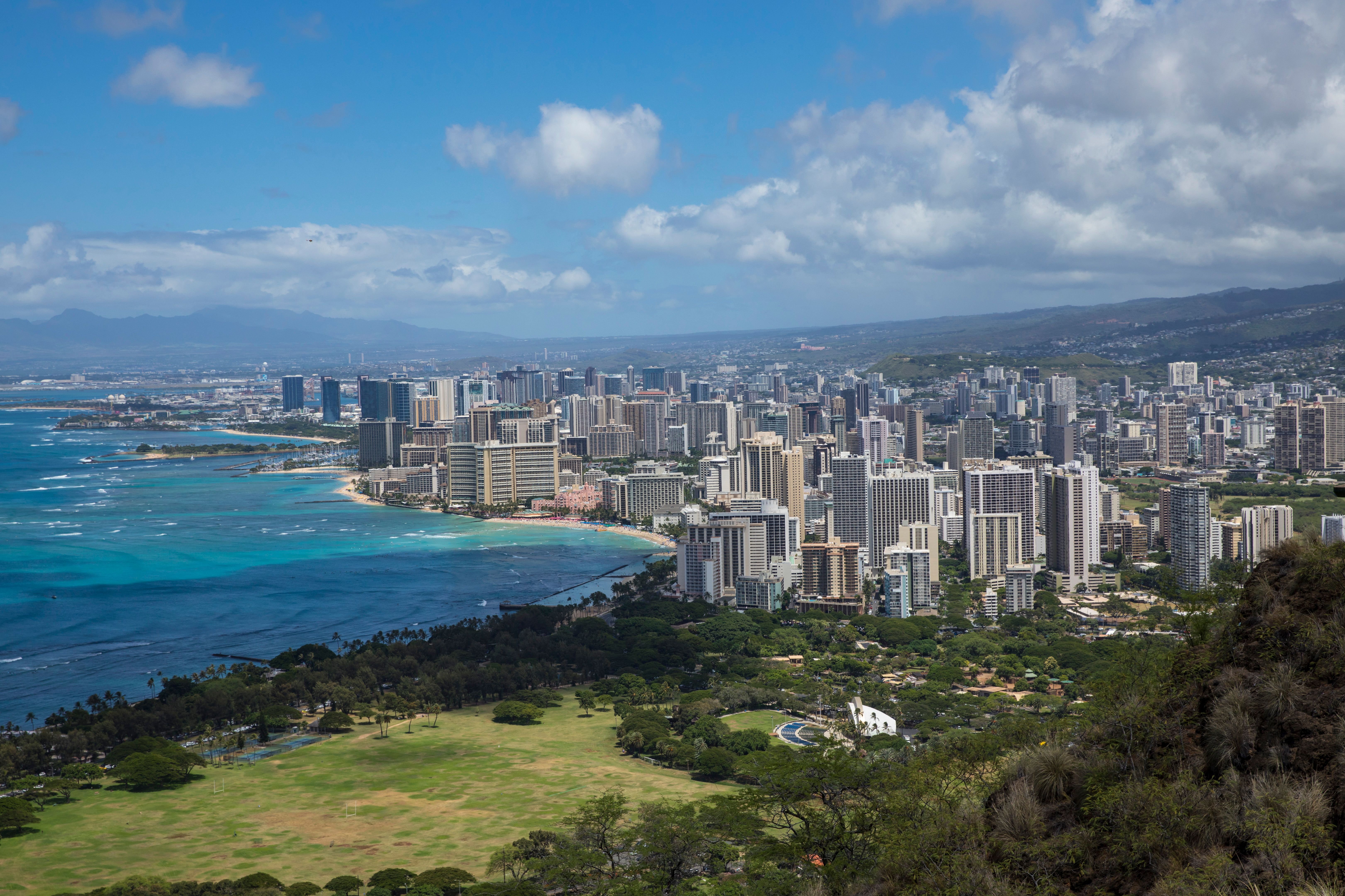 Ultimate Oʻahu Private Helicopter Experience: All Window Seats Review Review 2026 - Aerial view of Honolulu's skyline with the Pacific Ocean, captured from Diamond Head crater.