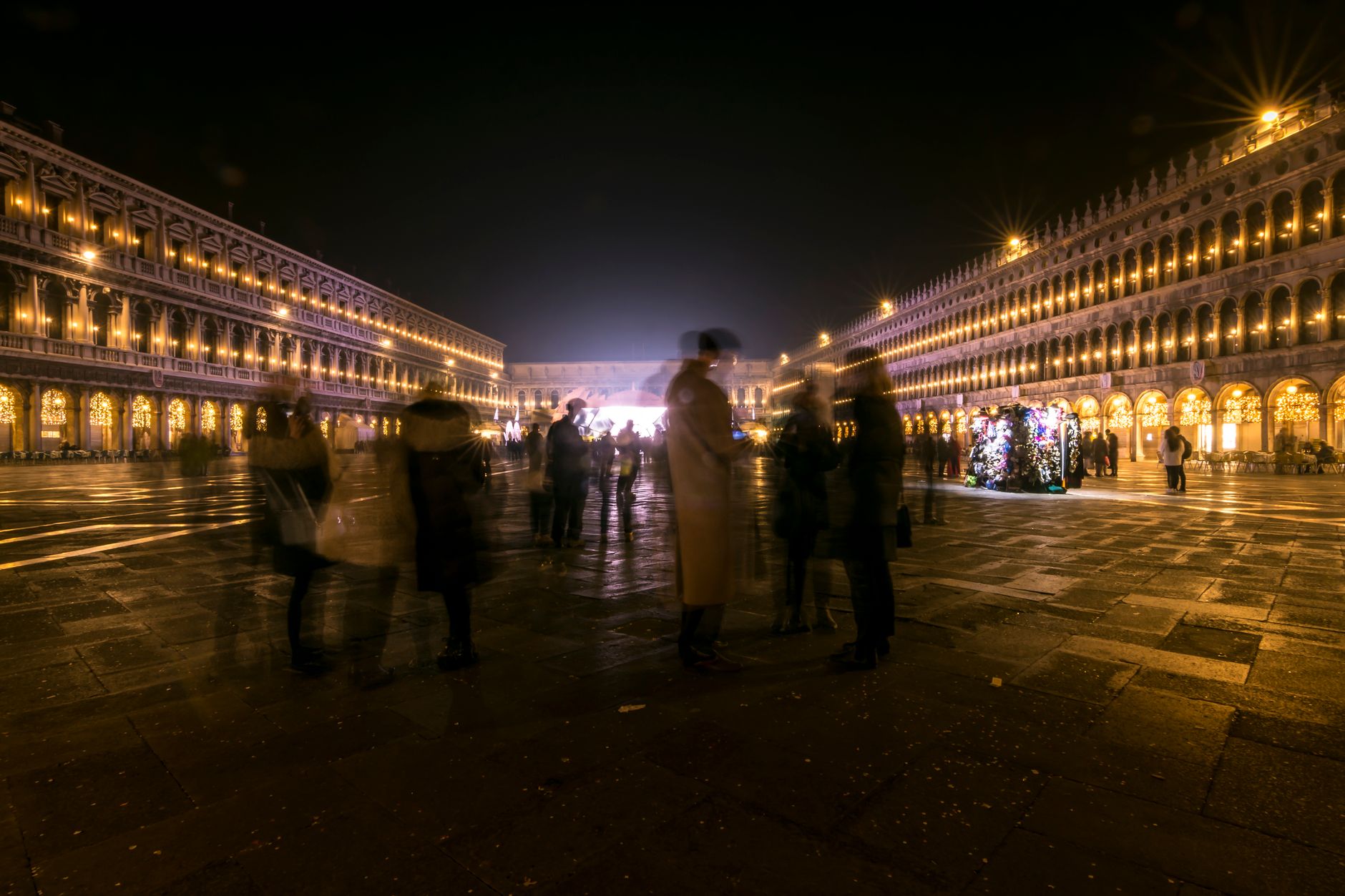 Italian piazza tourists evening