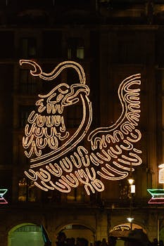 LED display of Mexican eagle at night in Zocalo, Mexico City, celebrating Independence Day.