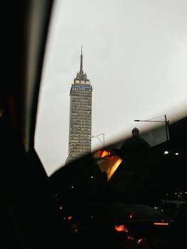 A view of Torre Latinoamericana during a rainy evening in Mexico City, CDMX.