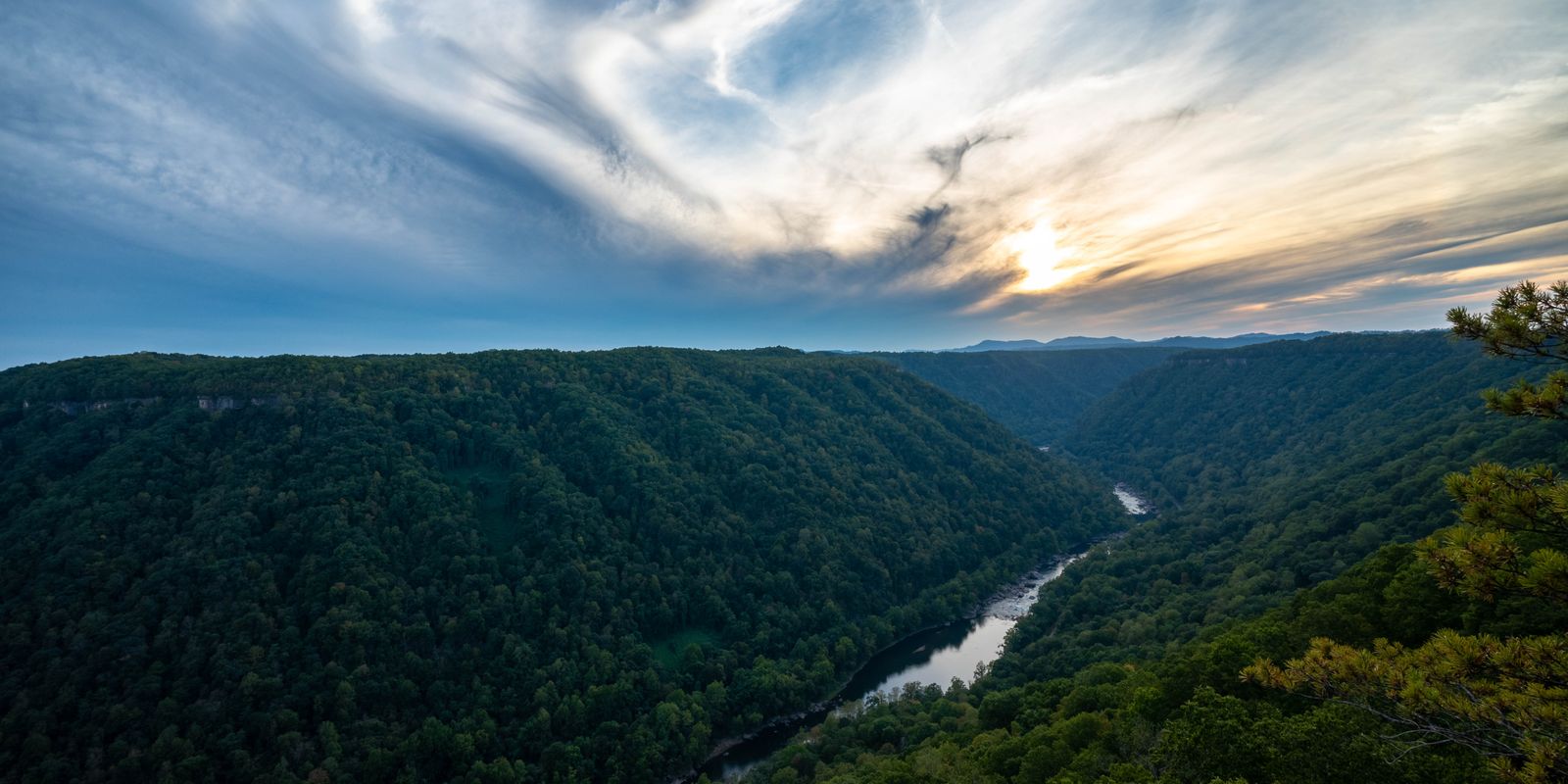 River winding through lush green hills